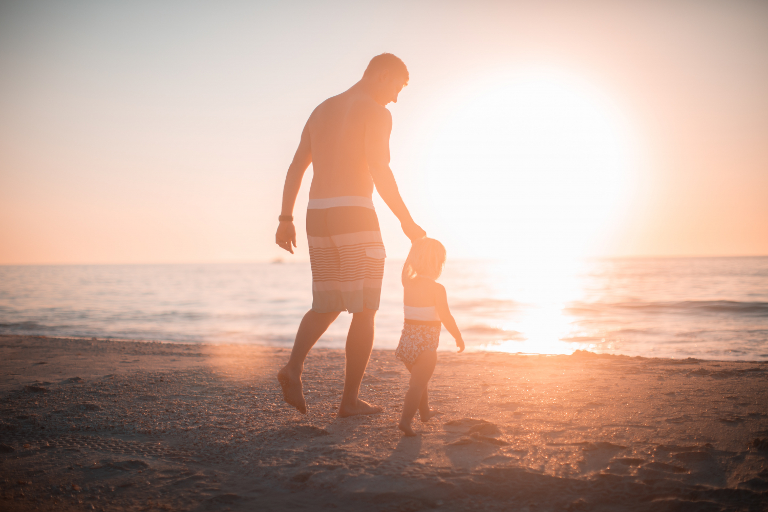 Sunset-Father-Walks-With-His-Daughter-Beach